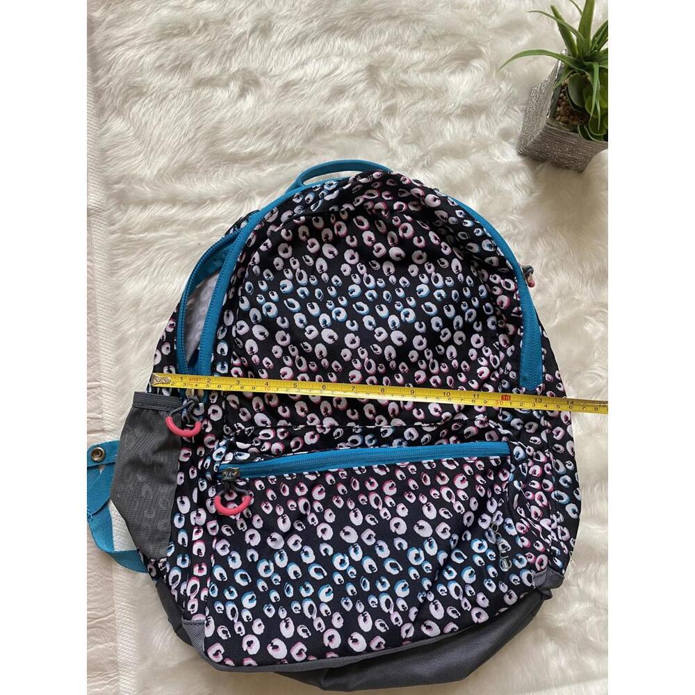 Multi-Color Patterned Backpack With Blue Accents - image 3